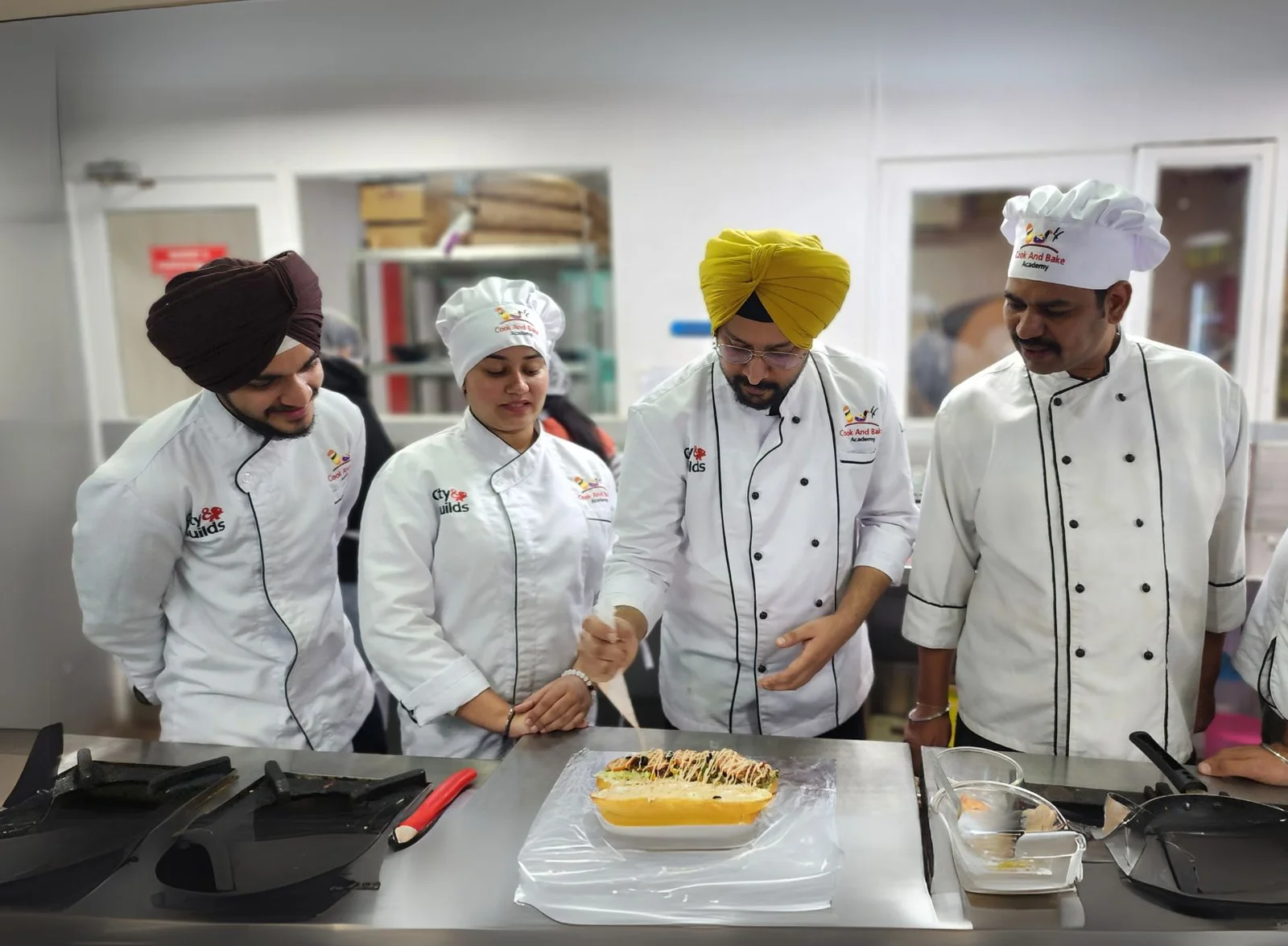 Culinary students undergoing hands-on cooking training at Cook and Bake Academy